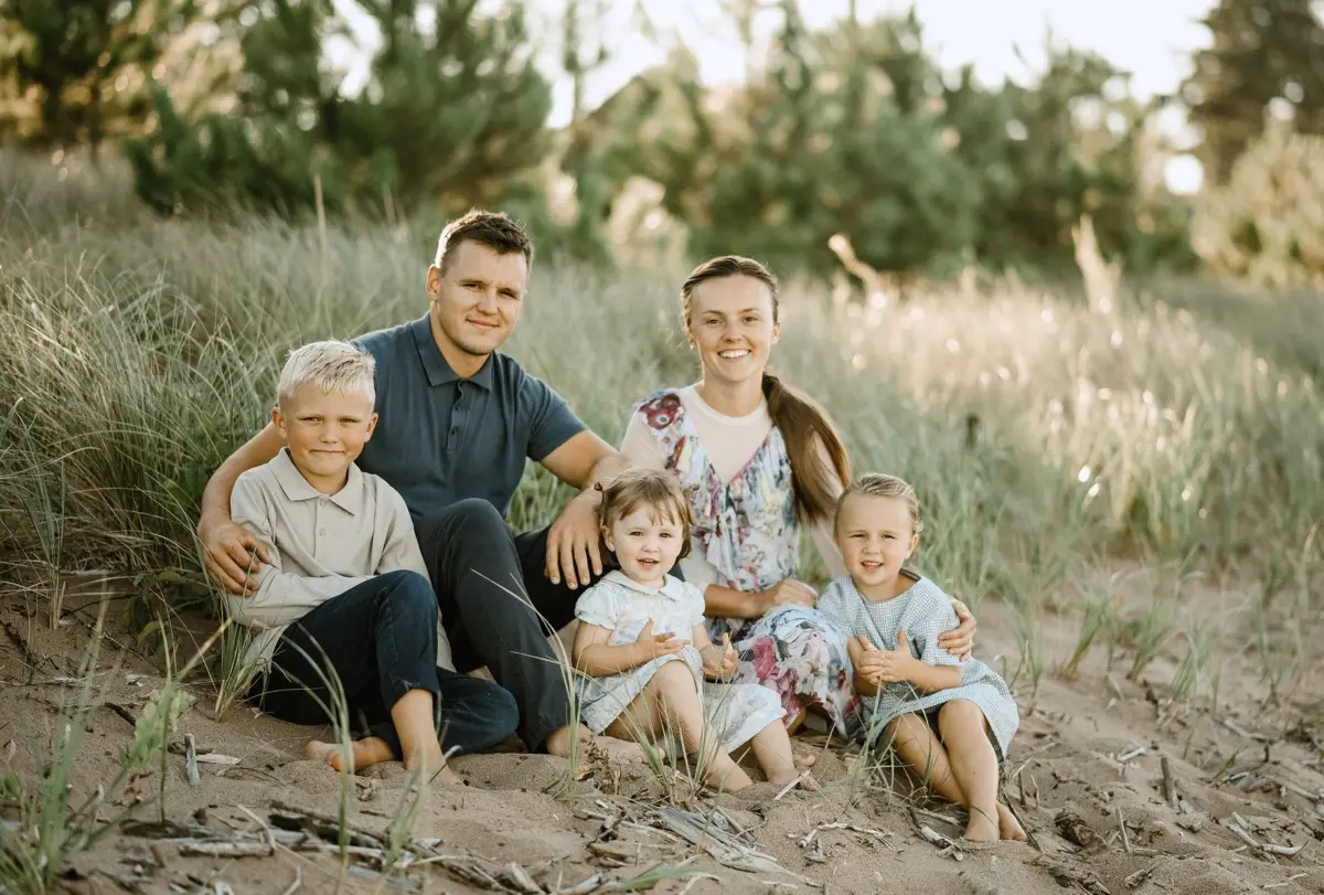 Torin, owner of Elevate Co., with his family